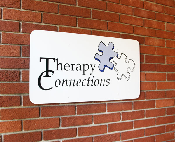 Therapy Connections sign on the exterior brick wall